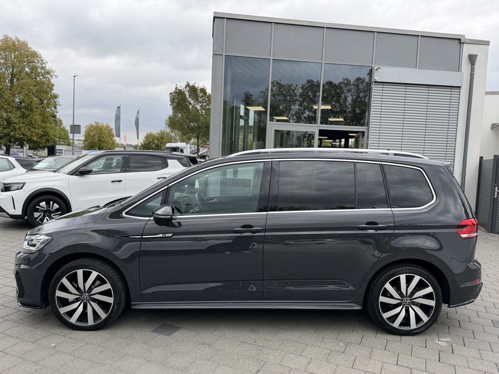 Touran 1.5 TSI Highline DSG 7-Sitzer NAVI PANO