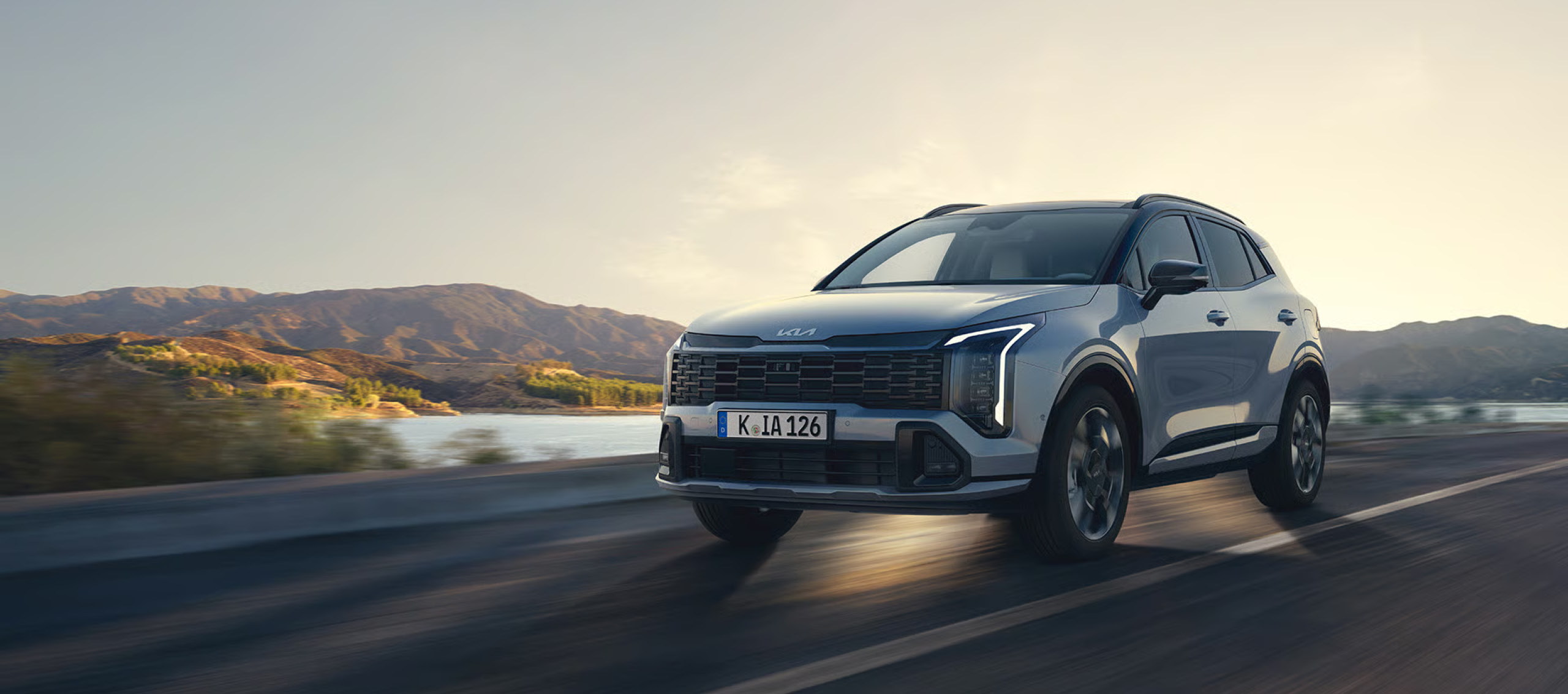 kopfbild kia sportage fahraufnahme